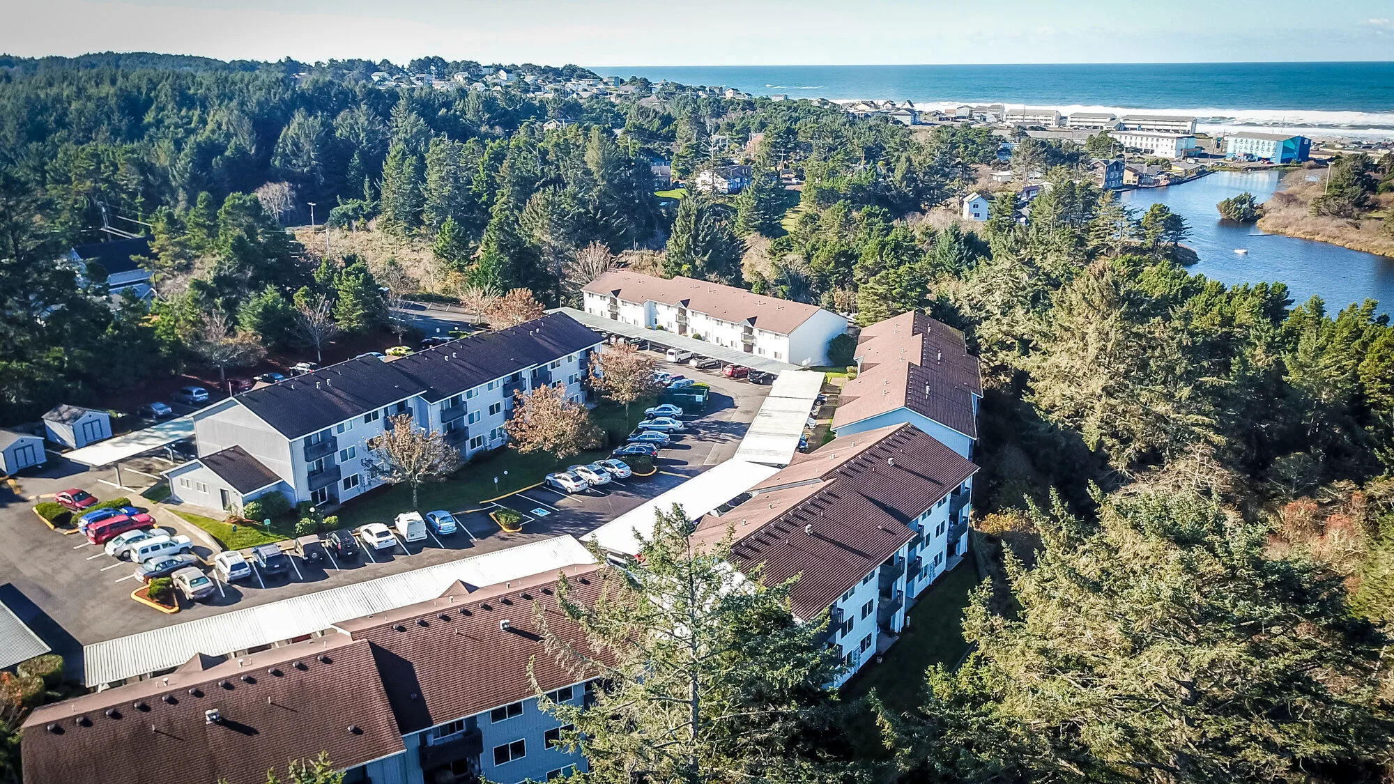 Aerial view of the Oregon coast and ocean beyond Devils Lake